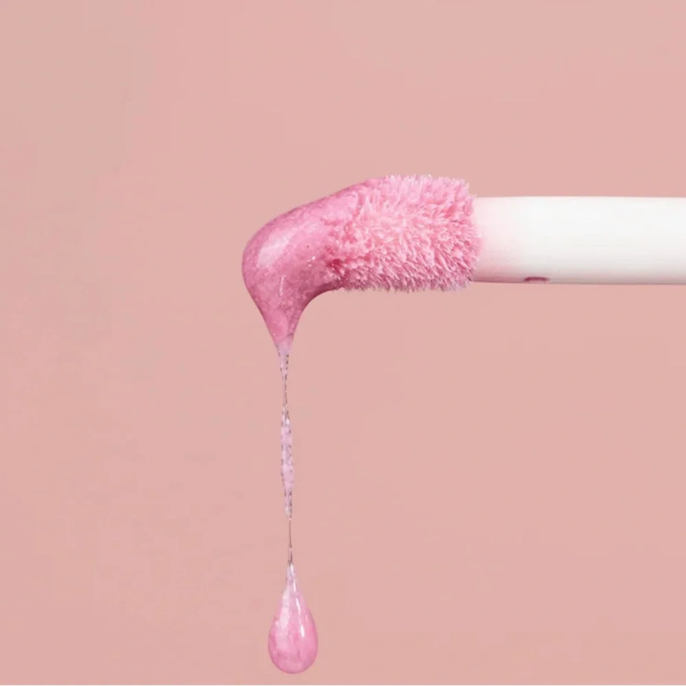 Dibs Beauty Go To Glossy Balm in Rock Candy or MIMS mega shiny pretty gloss